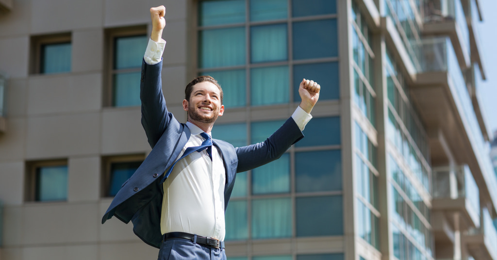 Student celebrating surviving the cfa exam