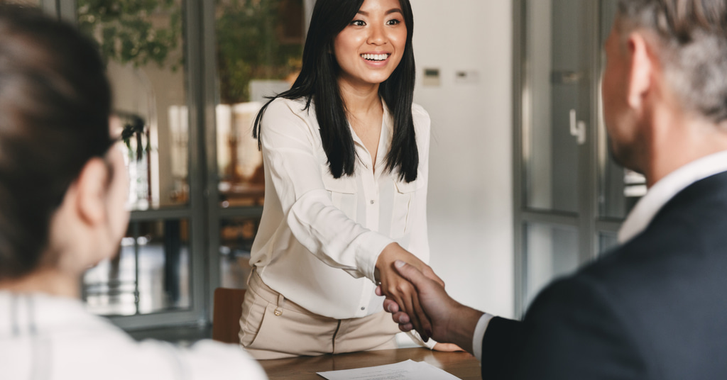 a cfa level 1 candidate shaking hands with a prospective employer